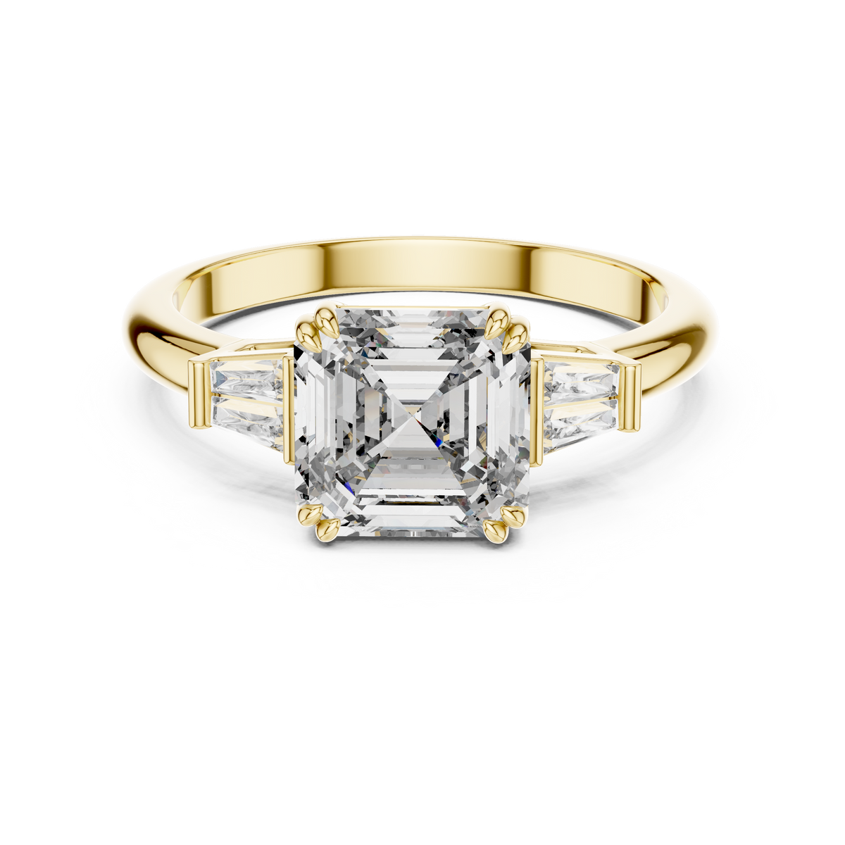 Emerald cut lab grown diamond three stone ring in yellow gold, angled view