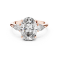 3.10 CTW oval cut three stone lab grown diamond engagement ring in rose gold, front view