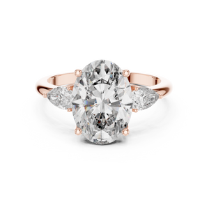3.10 CTW oval cut three stone lab grown diamond engagement ring in rose gold, front view