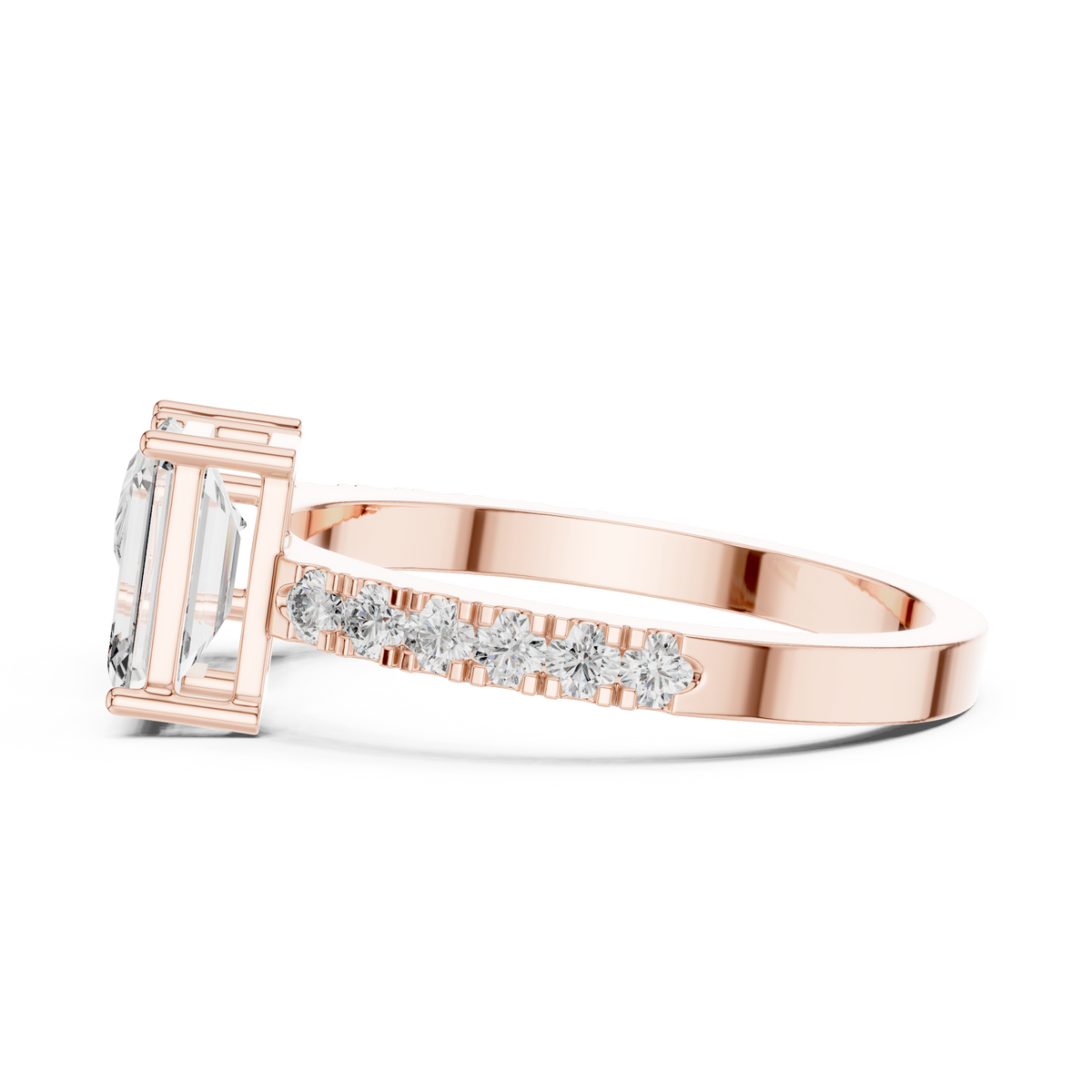 A side view of a luxury Toi et Moi lab-grown diamond engagement ring crafted in solid rose gold, showcasing the emerald-cut center diamond and brilliant pavé diamonds along the band.