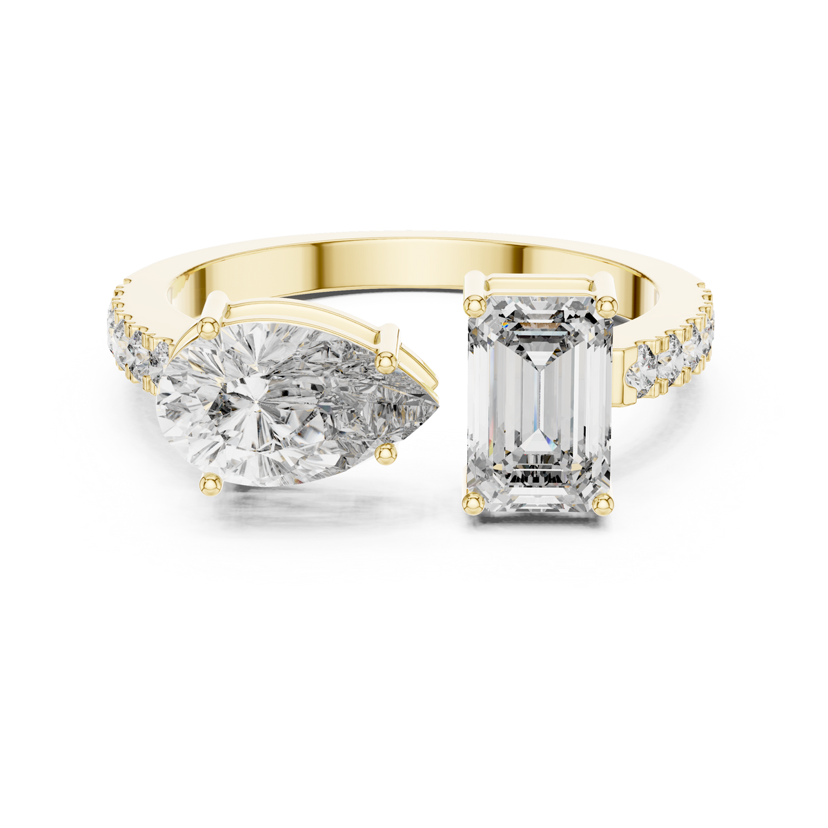 Toi et Moi lab grown diamond engagement ring with emerald and pear cut stones in yellow gold, front view