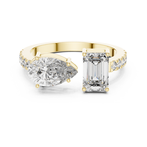 Toi et Moi lab grown diamond engagement ring with emerald and pear cut stones in yellow gold, front view
