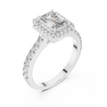 White gold emerald cut engagement ring with halo and pave band