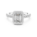 Top view of white gold emerald cut engagement ring with diamond halo and pave band