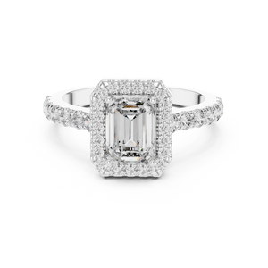 Top view of white gold emerald cut engagement ring with diamond halo and pave band