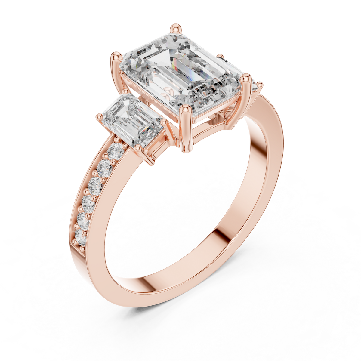 Emerald cut three stone lab grown diamond ring in rose gold, angled view