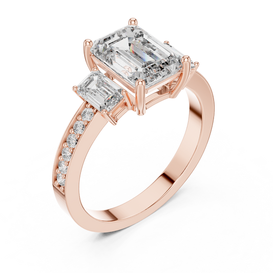 Emerald cut three stone lab grown diamond ring in rose gold, angled view