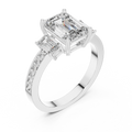 Side profile of white gold three-stone emerald cut diamond ring