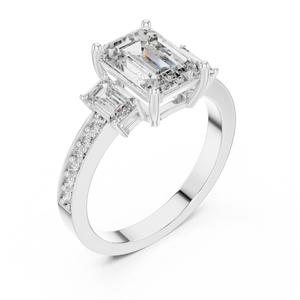 Side profile of white gold three-stone emerald cut diamond ring