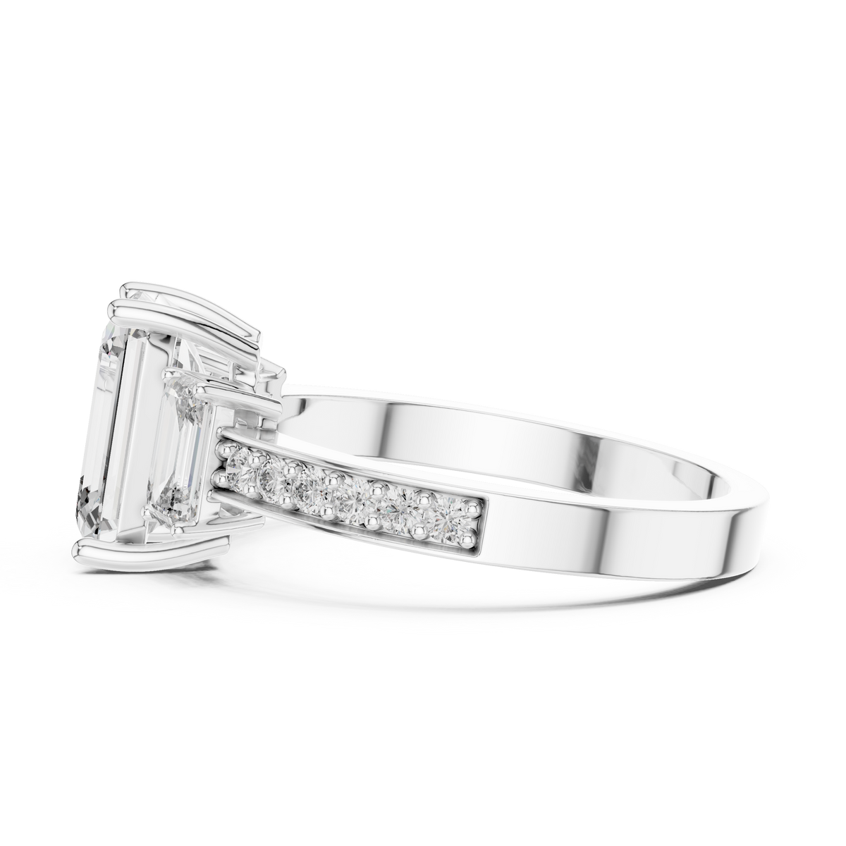 Side profile of white gold three-stone emerald cut diamond ring