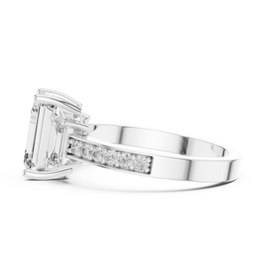 Side profile of white gold three-stone emerald cut diamond ring