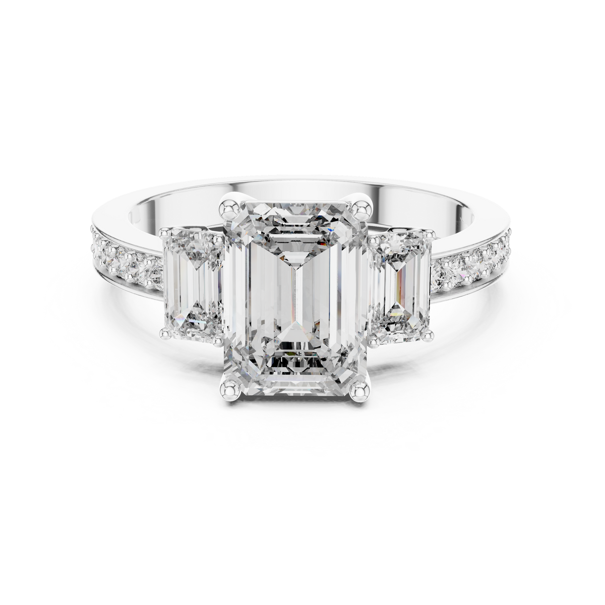 Close-up detail of white gold three-stone emerald cut diamond ring