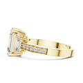 Side profile of yellow gold three-stone emerald cut diamond ring