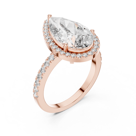 Pear-cut diamond halo engagement ring in rose gold setting