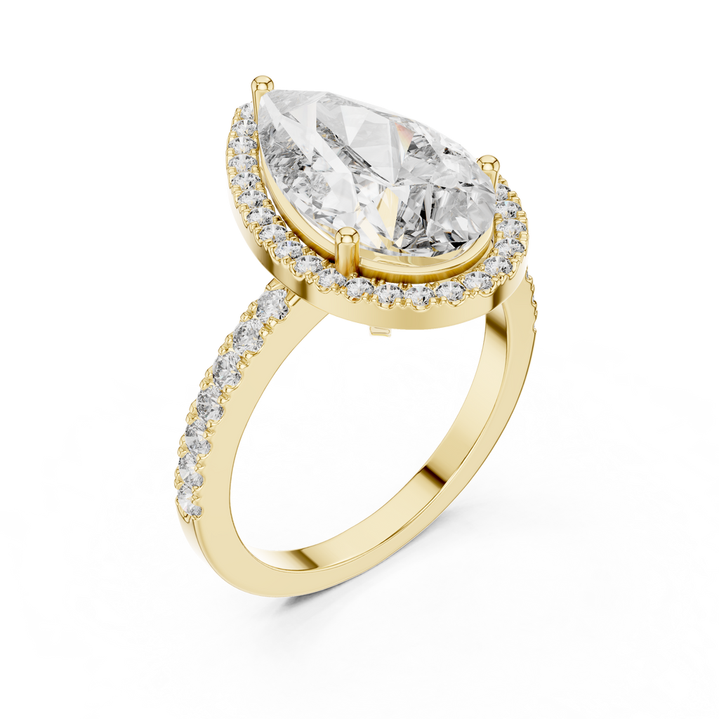 Front view of a stunning pear-cut diamond halo engagement ring in yellow gold
