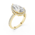 Front view of a stunning pear-cut diamond halo engagement ring in yellow gold