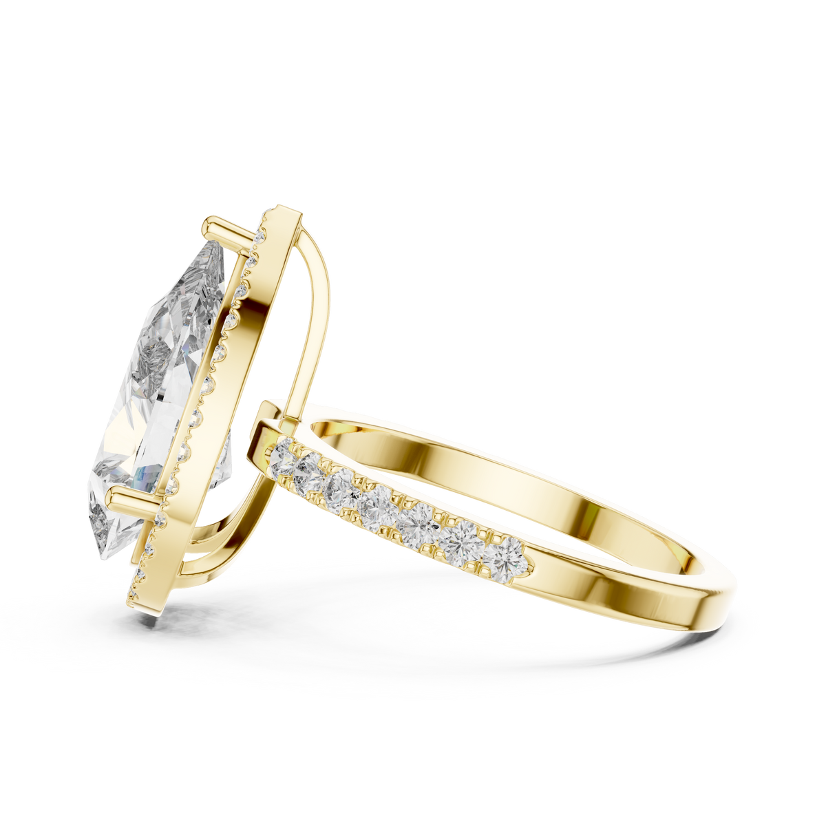 Side profile of a pear-cut diamond engagement ring in yellow gold with a hidden halo