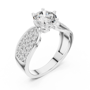 Close-up view of a white gold split shank engagement ring featuring a round lab-grown diamond center stone and pavé-set diamond shoulders on a transparent background.
