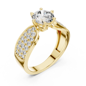 Close-up of a yellow gold split shank engagement ring featuring a round lab-grown diamond center stone and pavé-set diamond shoulders on a transparent background.