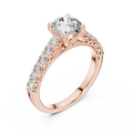 1.54 CTW round lab grown diamond side stone engagement ring in rose gold, angled view