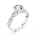 White gold round cut lab-grown diamond engagement ring with side stones on a transparent background