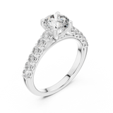White gold round cut lab-grown diamond engagement ring with side stones on a transparent background