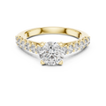 Yellow gold round cut lab-grown diamond engagement ring with side stones on a transparent background
