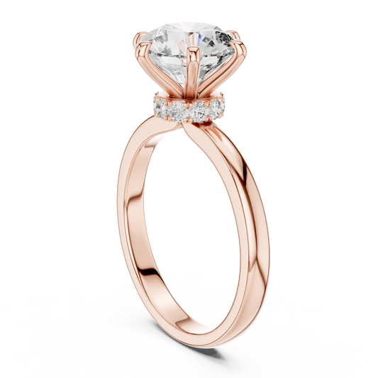 Rose gold round solitaire lab-grown diamond engagement ring with six-prong setting on white background