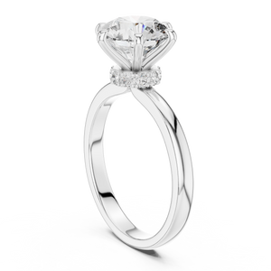 White gold round solitaire lab-grown diamond engagement ring with six-prong setting and hidden halo.
