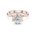 Rose gold round solitaire lab-grown diamond engagement ring with six-prong setting on white background