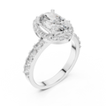 White gold 1.60 CT oval cut lab grown diamond halo engagement ring with pavé side stones on a white background.