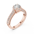 Side angle view of a 0.65 CT round cut lab grown diamond halo baguette engagement ring in rose gold