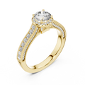 Side angle view of a 0.65 CT round cut lab grown diamond halo baguette engagement ring in yellow gold