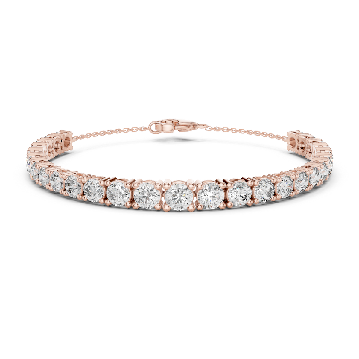 Rose gold graduated round diamond tennis bracelet, close-up view
