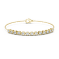 Yellow gold round diamond chain bracelet, close-up view