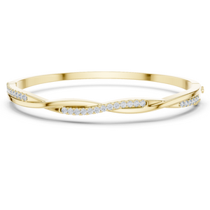 Yellow gold twisted diamond bangle bracelet, close-up view