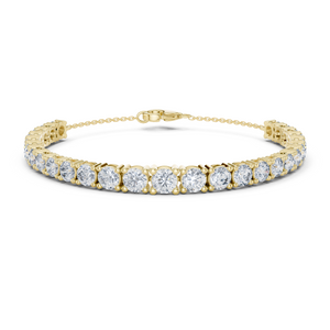 Yellow gold graduated round diamond tennis bracelet, close-up view