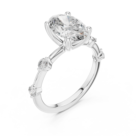 White gold lab grown diamond oval cut ring with spaced accents, angled view