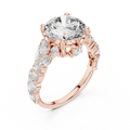 Rose gold lab grown diamond round cut ring with fancy-shaped accents, angled view