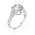 White gold lab grown diamond round cut ring with fancy-shaped accents, angled view