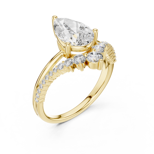 Yellow gold lab grown diamond pear cut ring with crescent accents, angled view