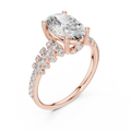 Rose gold lab grown diamond oval cut ring with scattered accents, angled view