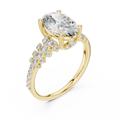 Yellow gold lab grown diamond oval cut ring with scattered accents, angled view