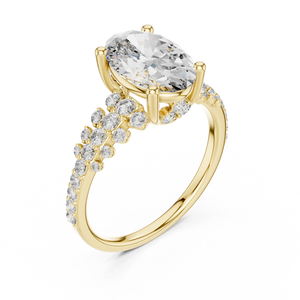 Yellow gold lab grown diamond oval cut ring with scattered accents, angled view