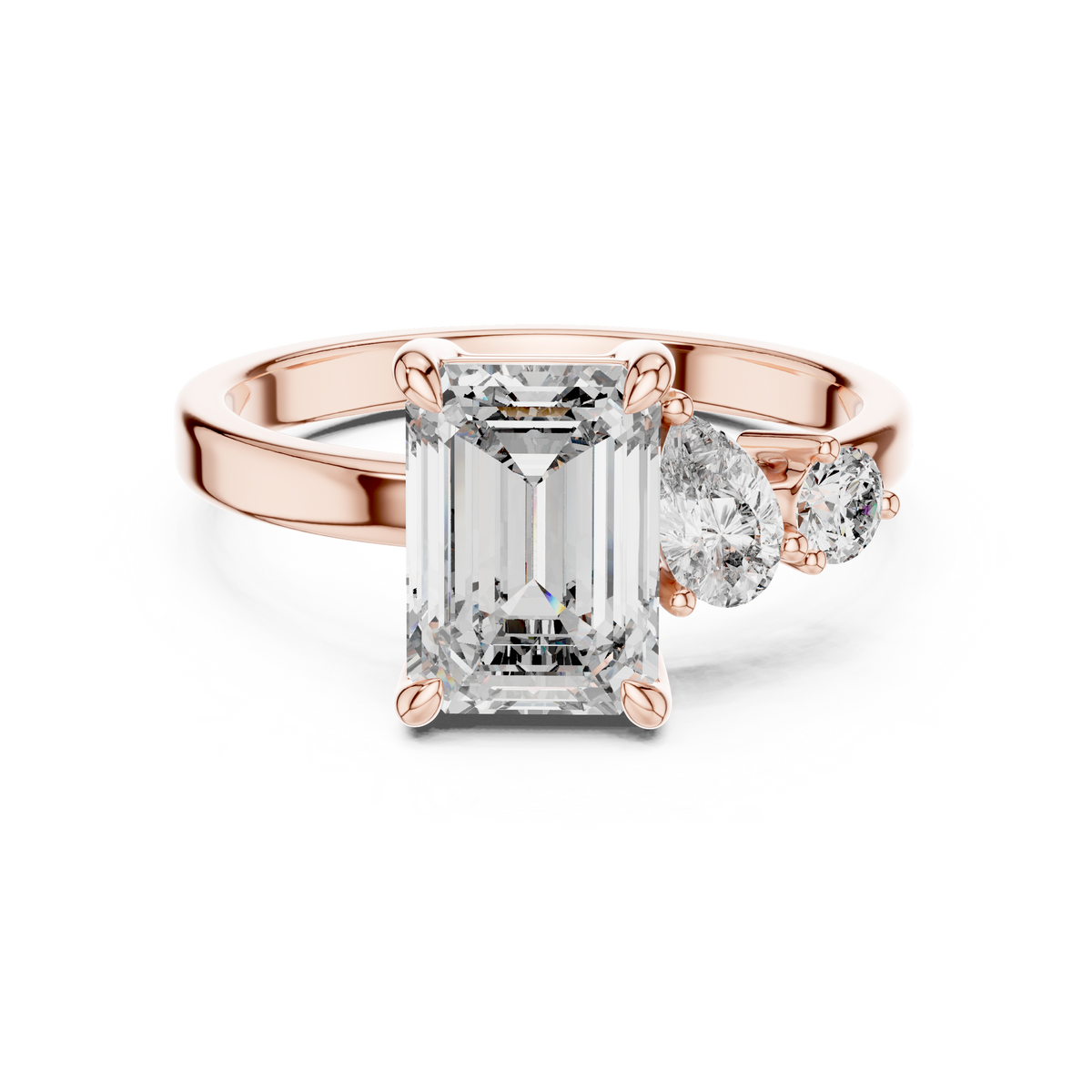 Rose gold lab grown diamond emerald cut ring with asymmetric accents, angled view — Luzora Jewels