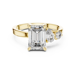 White gold lab grown diamond emerald cut ring with asymmetric accents, angled view — Luzora Jewels