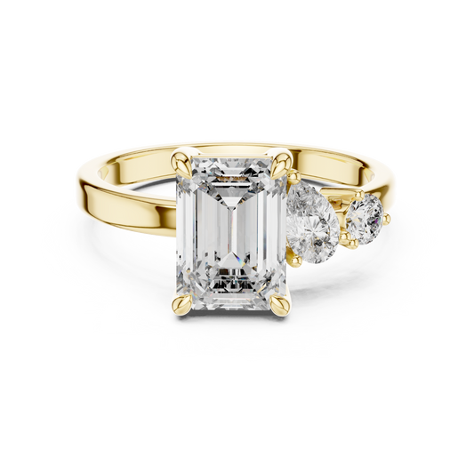 White gold lab grown diamond emerald cut ring with asymmetric accents, angled view — Luzora Jewels