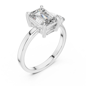 Rose gold 2 CT lab grown diamond emerald cut ring with asymmetric accents, front view — Luzora Jewels
