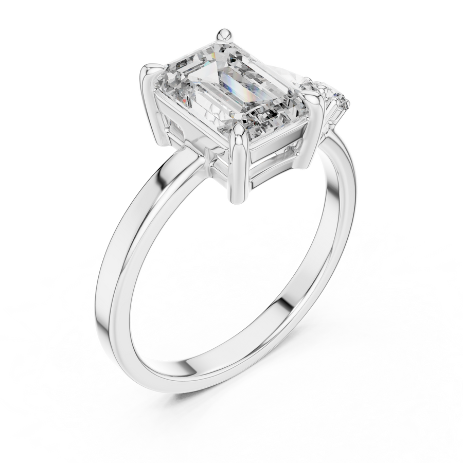 Rose gold 2 CT lab grown diamond emerald cut ring with asymmetric accents, front view — Luzora Jewels