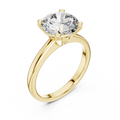 Yellow gold lab grown diamond round cut double-prong solitaire ring, angled view — Luzora Jewels